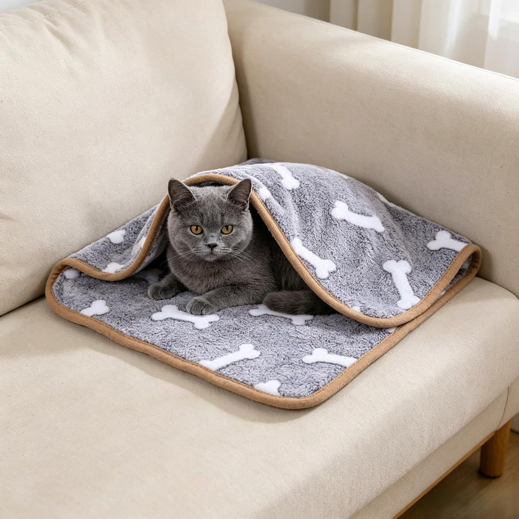 Close up view of the reinforced bound edges on the pet blanket.