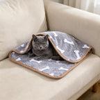 Close up view of the reinforced bound edges on the pet blanket.