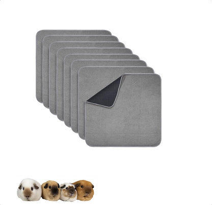 Clean organized guinea pig cage setup with gray fleece liners