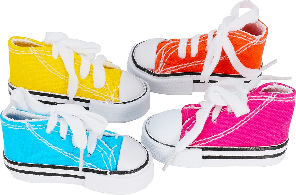 Six colorful mini sneaker bird toys arranged on a flat surface