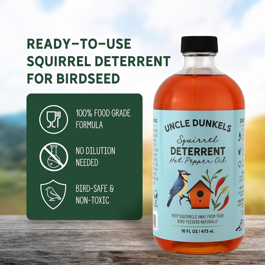 Squirrel avoiding bird feeder after using Uncle Dunkels