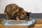 Durable corrugated cardboard pet scratch pad for furniture protection.