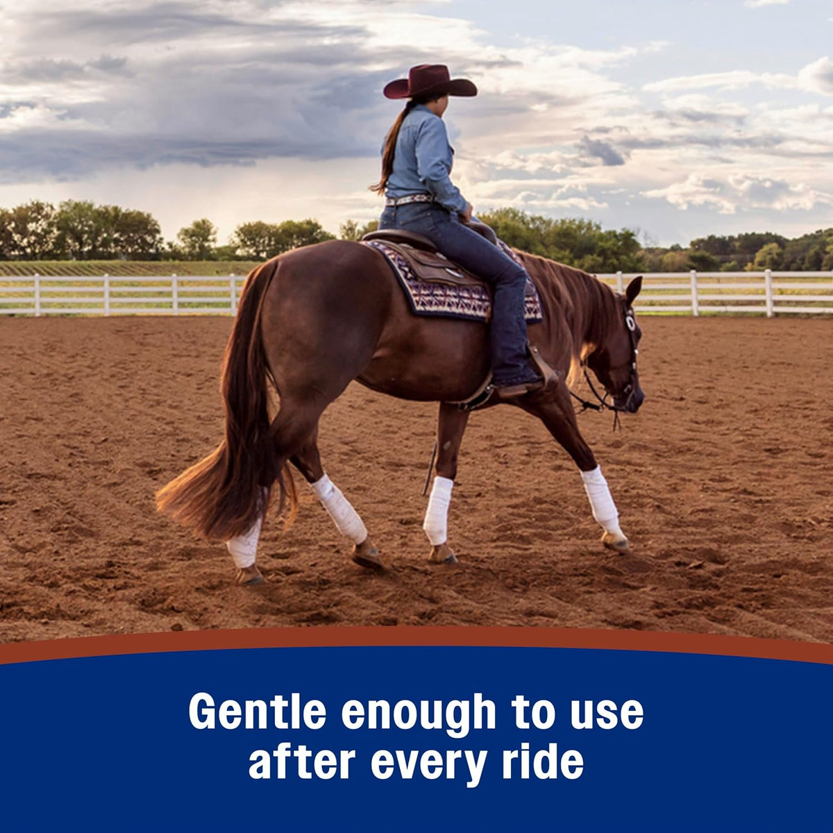 Buffing leather riding boots with a soft cloth