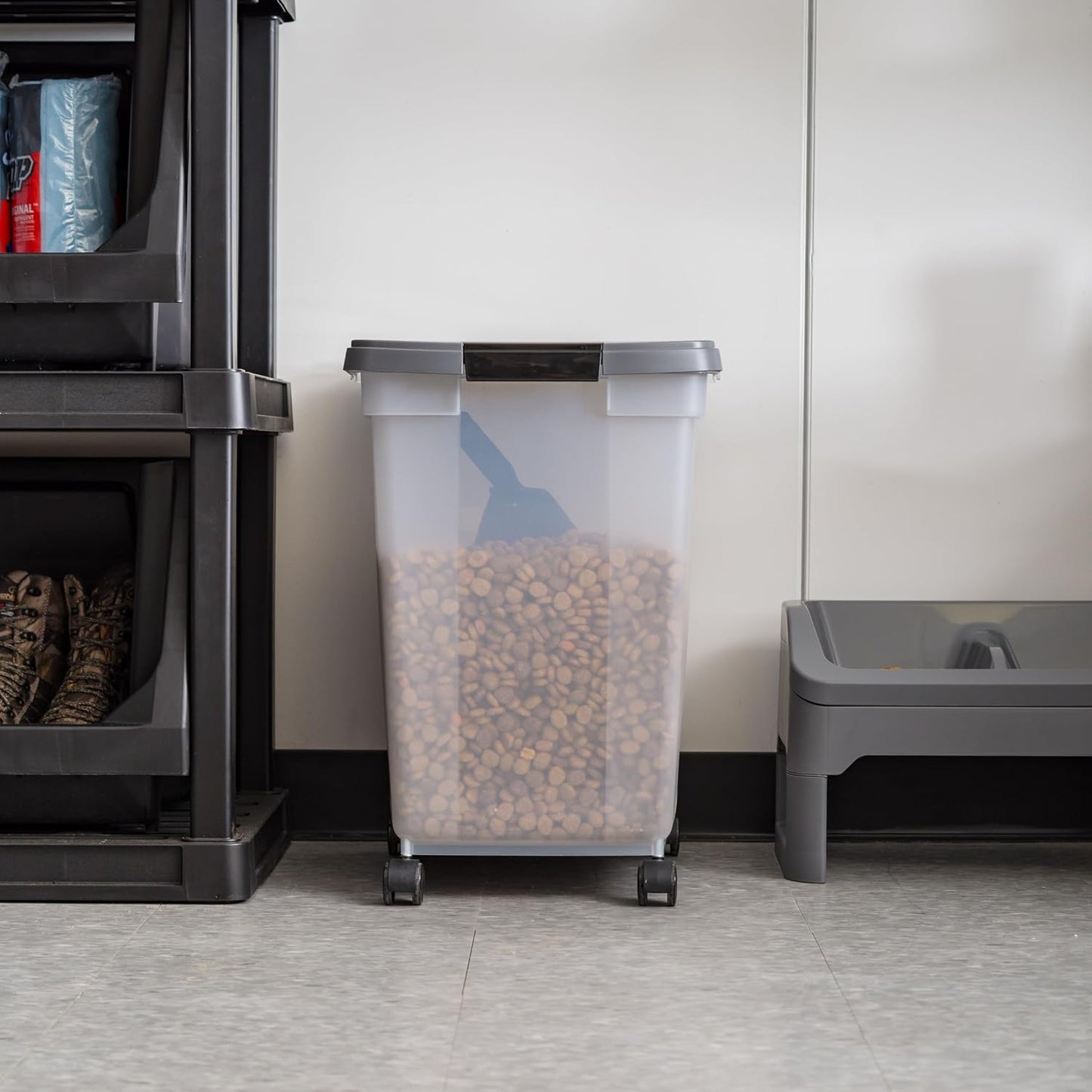 Translucent pet food storage bin showing contents