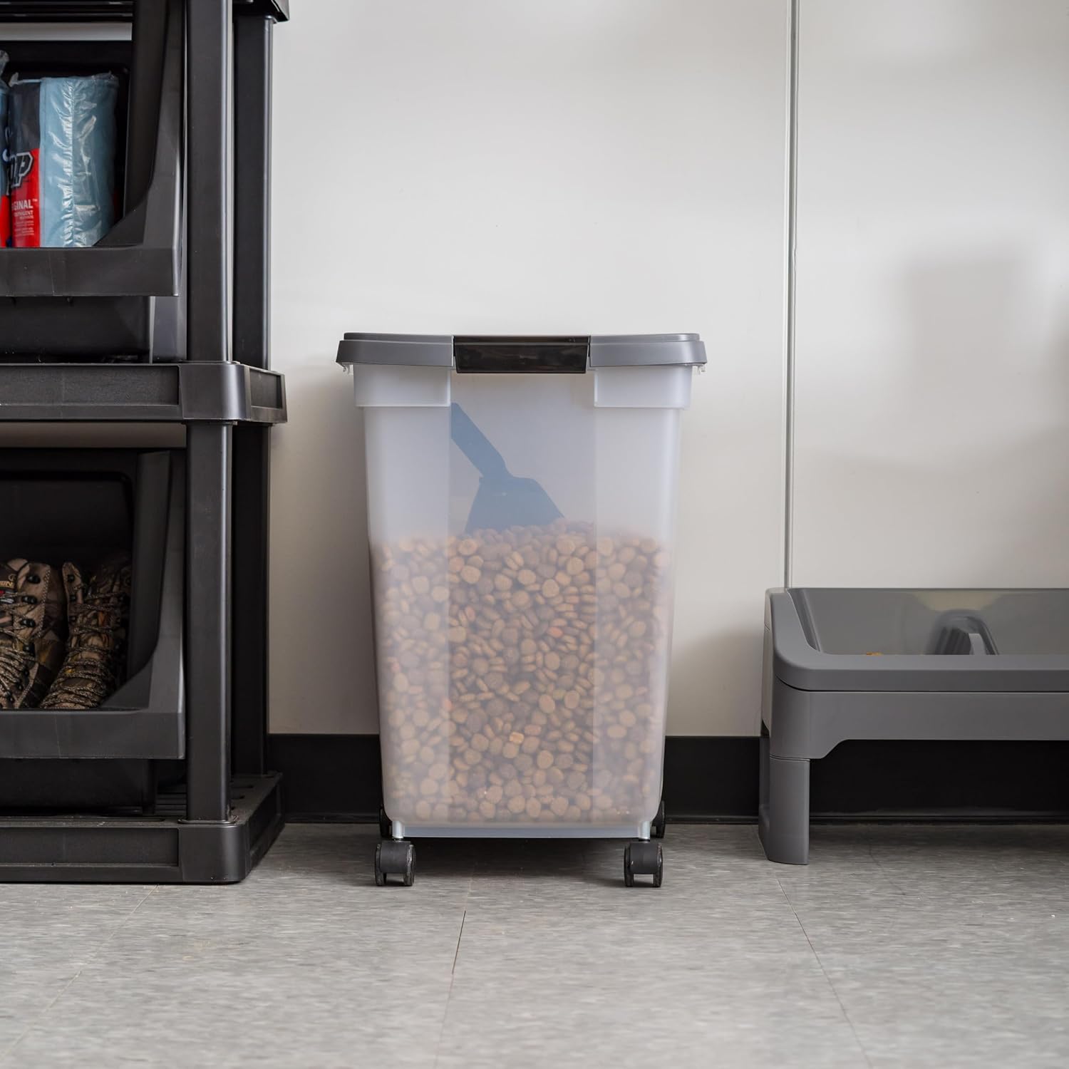 Translucent pet food storage bin showing contents