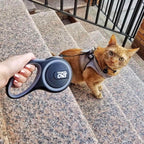 Travel Cat Captain retractable leash 10 foot black cord and casing close-up.