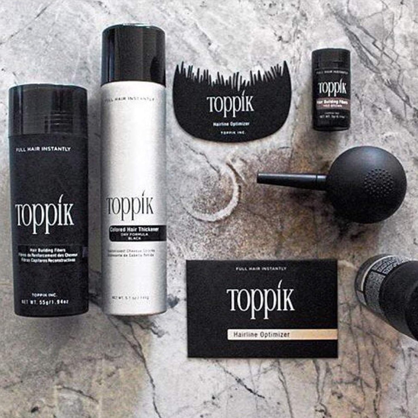 Toppik fine mist hair styling spray showing the official product labels and sizing.