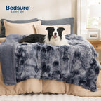 Bedsure faux fur calming pet blanket protecting living room fabric couch.