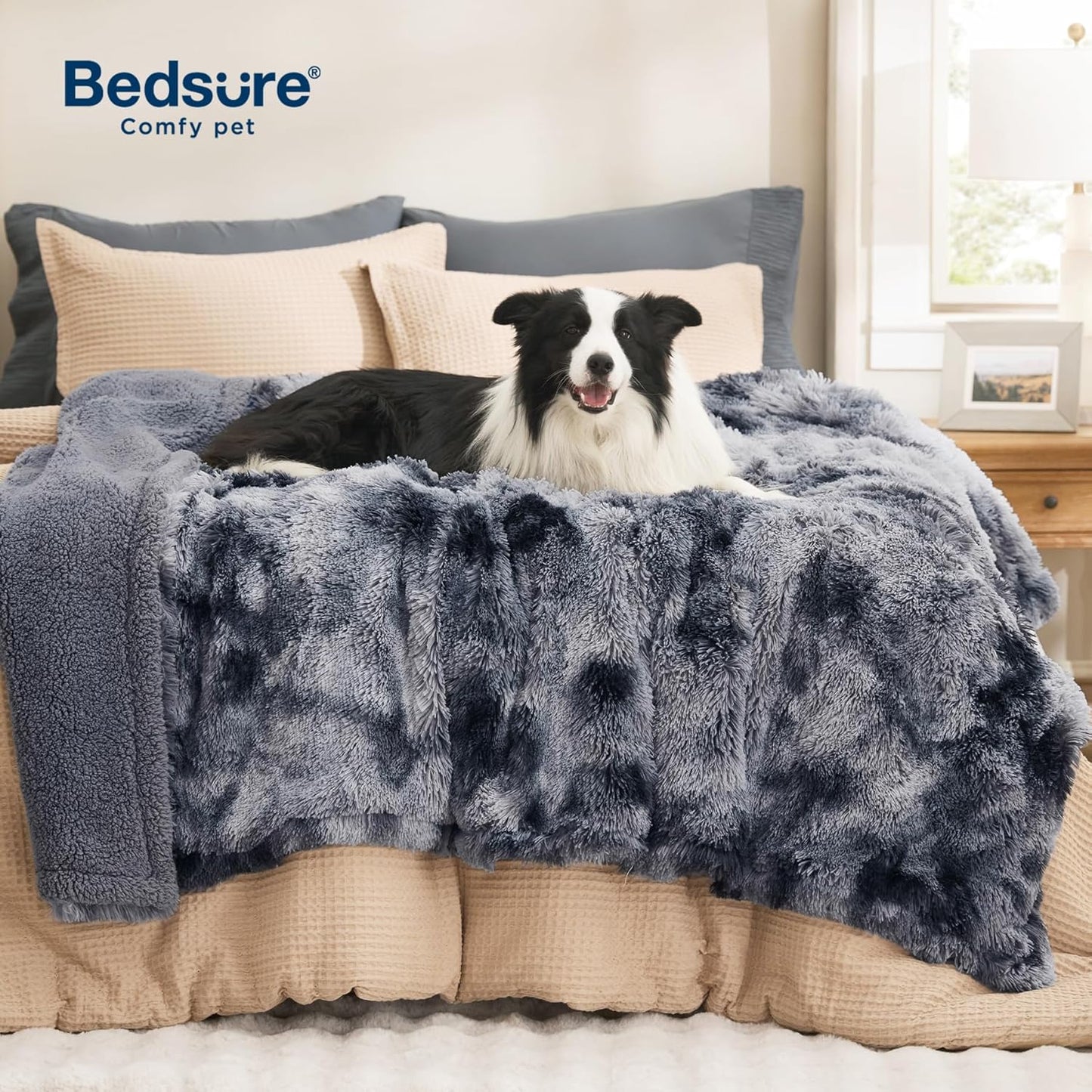 Bedsure faux fur calming pet blanket protecting living room fabric couch.