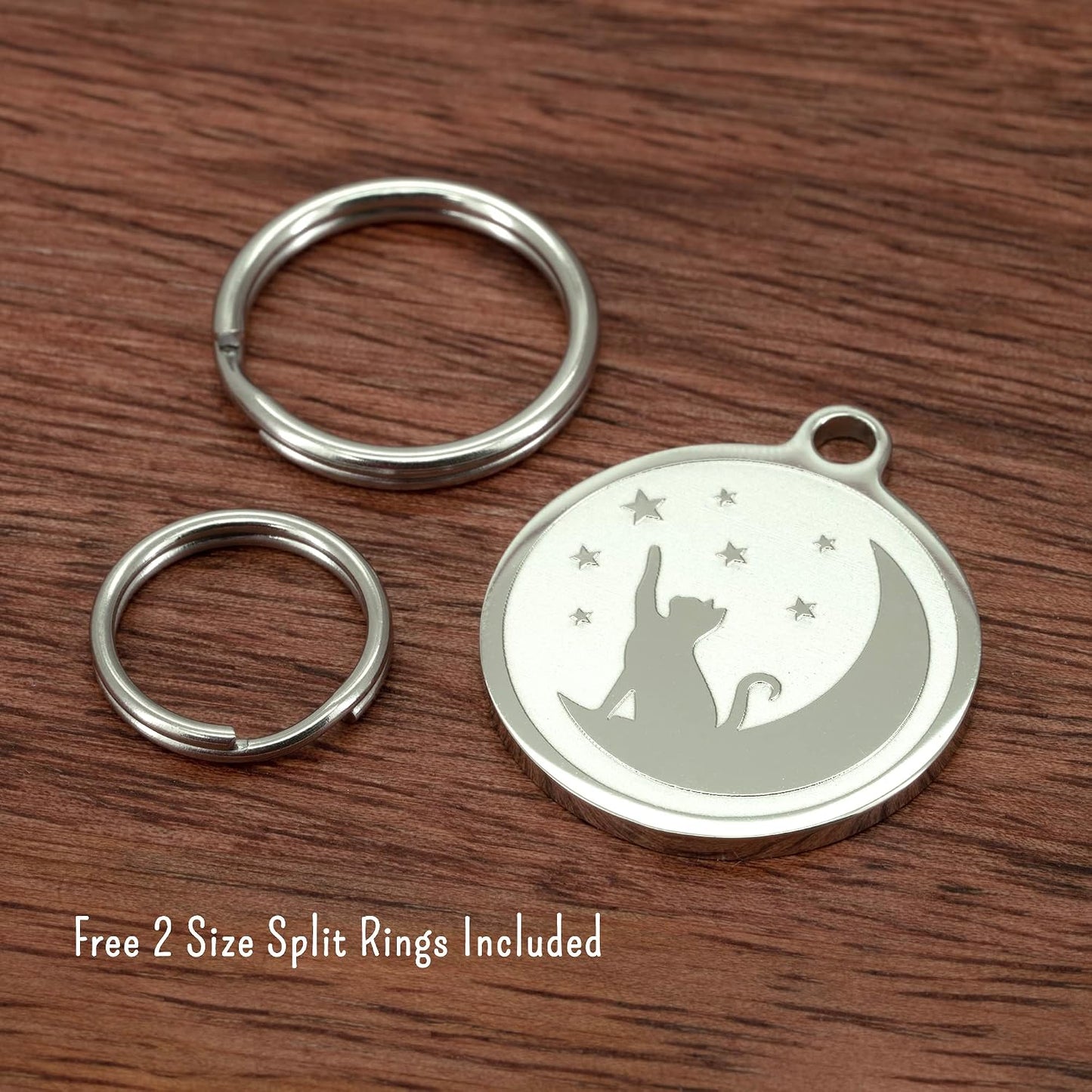 Ultra Joys stainless steel cat collar accessory attached to a colorful kitten harness with a split ring