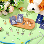 XunYee veterinary receptionist gifts set displaying the detailed corgi and shiba inu animal pendants close up