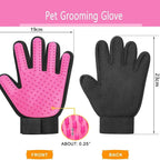 Pink deshedding brush glove being used to stroke and remove loose fur from a long-haired cat