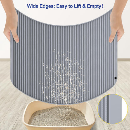 Flexible waterproof silicone pet feeding and litter mat being folded.