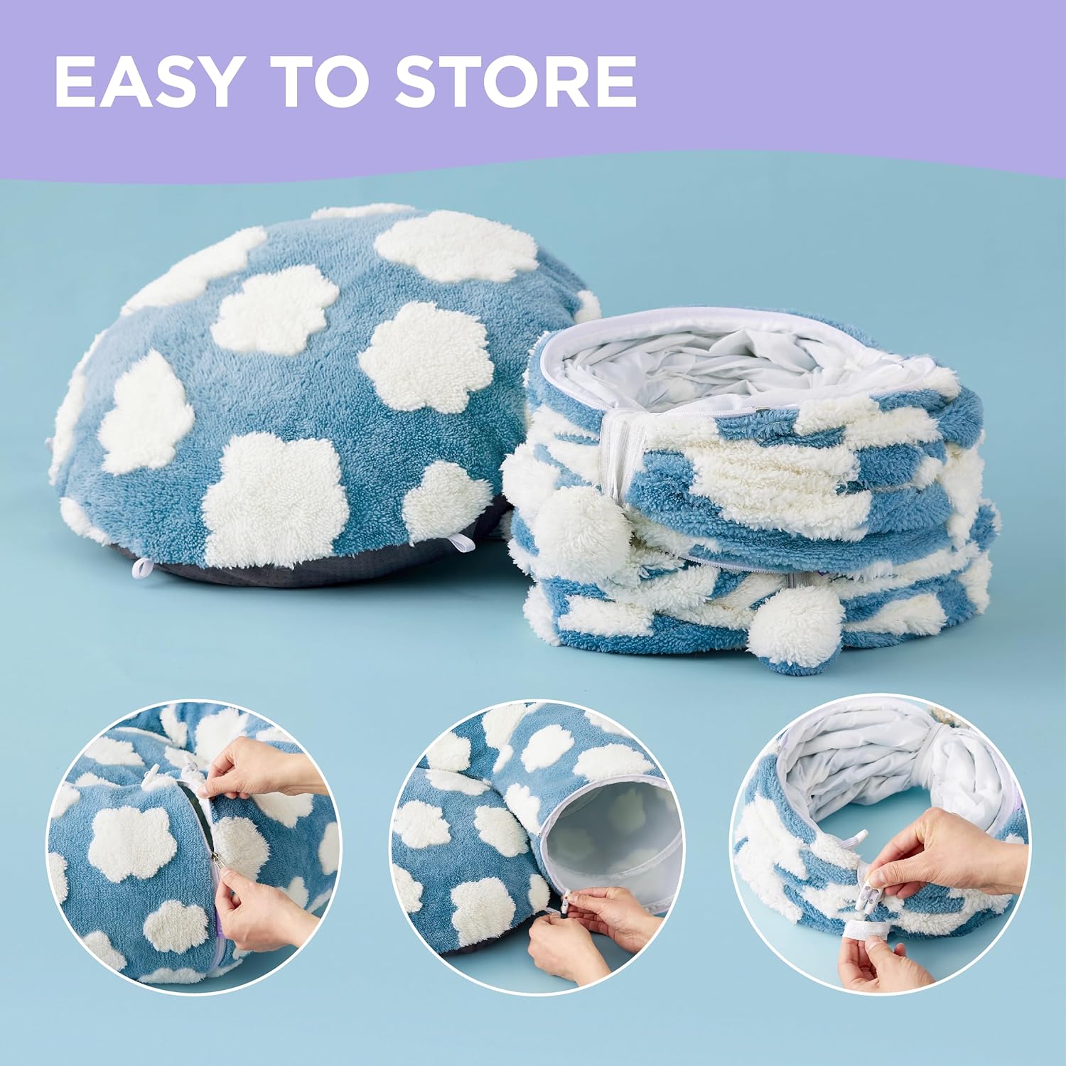 Kitten playing inside the blue cloud patterned pet peekaboo tunnel