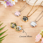 Gold-plated personalized dog memorial locket showing glitter paw design