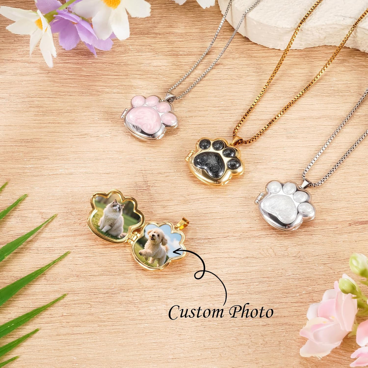 Gold-plated personalized dog memorial locket showing glitter paw design
