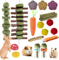 WDEFUN 21 piece rabbit chew toys front view showing full assortment of organic apple wood sticks and grass cakes