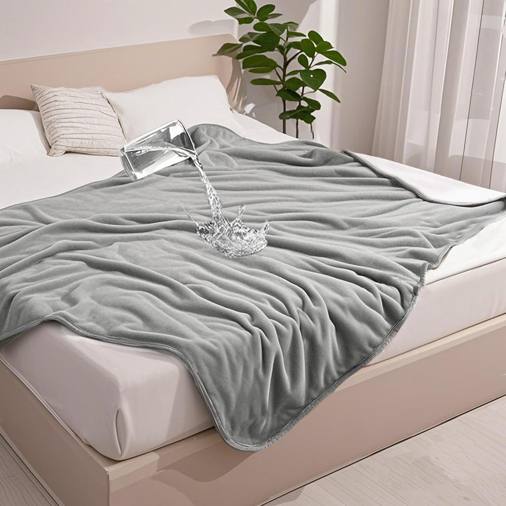 Gogobunny waterproof pet blanket grey front view spread on a bed