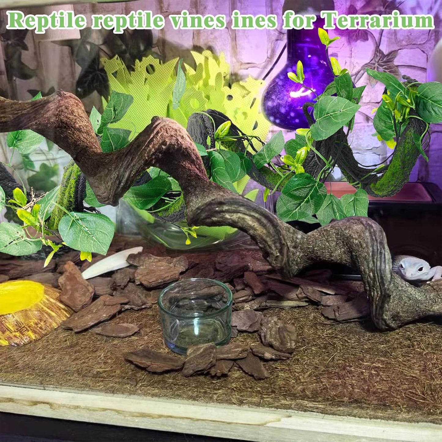 Detailed view of artificial green leaves on reptile climbing vine
