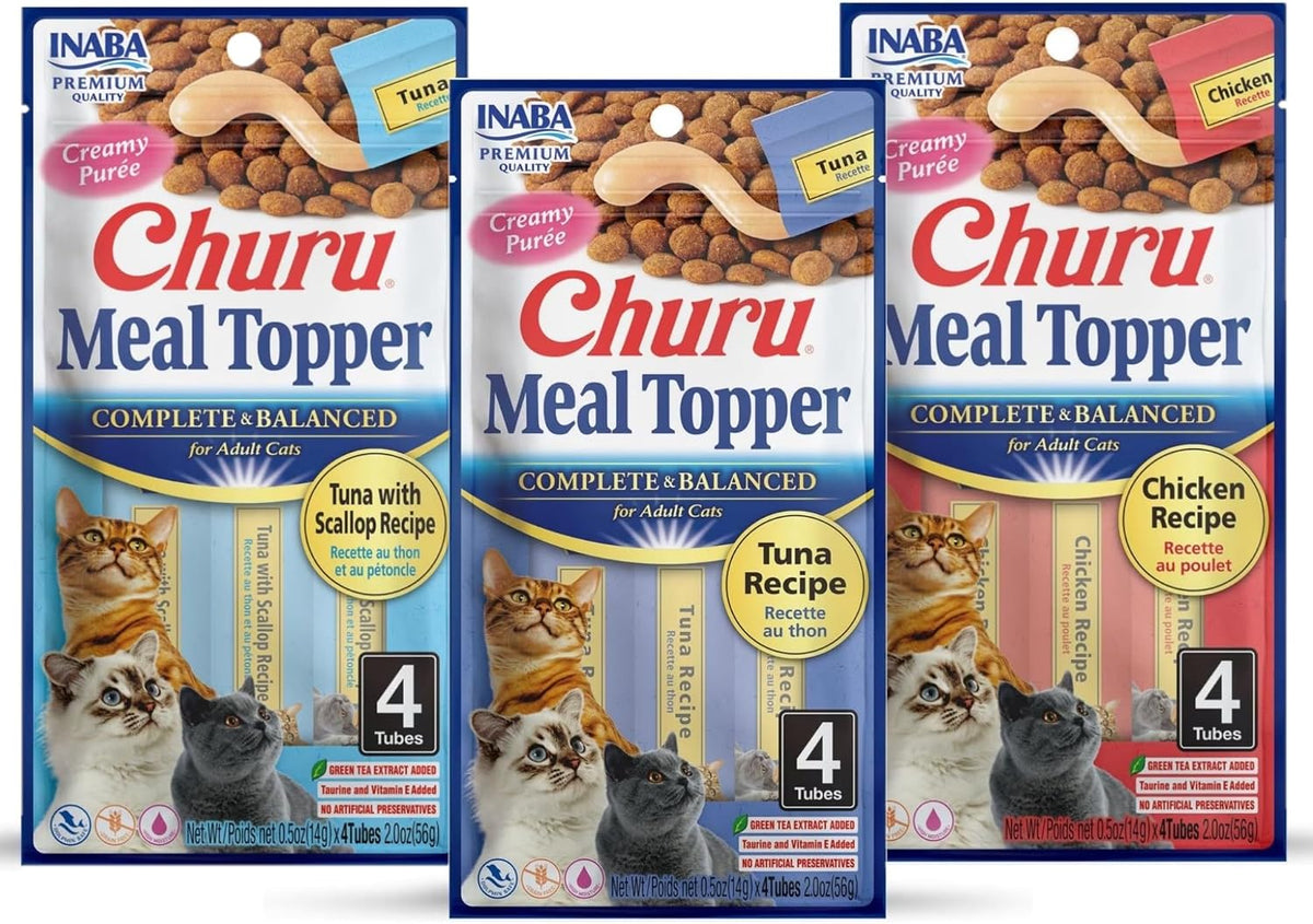 Hand feeding a cat with Inaba Churu Meal Topper tube