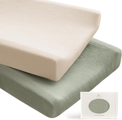 Konssy 2 Pack Muslin Changing Pad Covers front view of packaged neutral nursery sheets