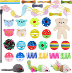 Assorted colorful kitten spring toys and crinkle balls arranged flat on a neutral background