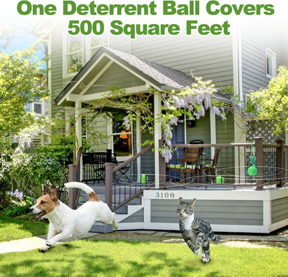Natural pet deterrent balls placed in a garden bed