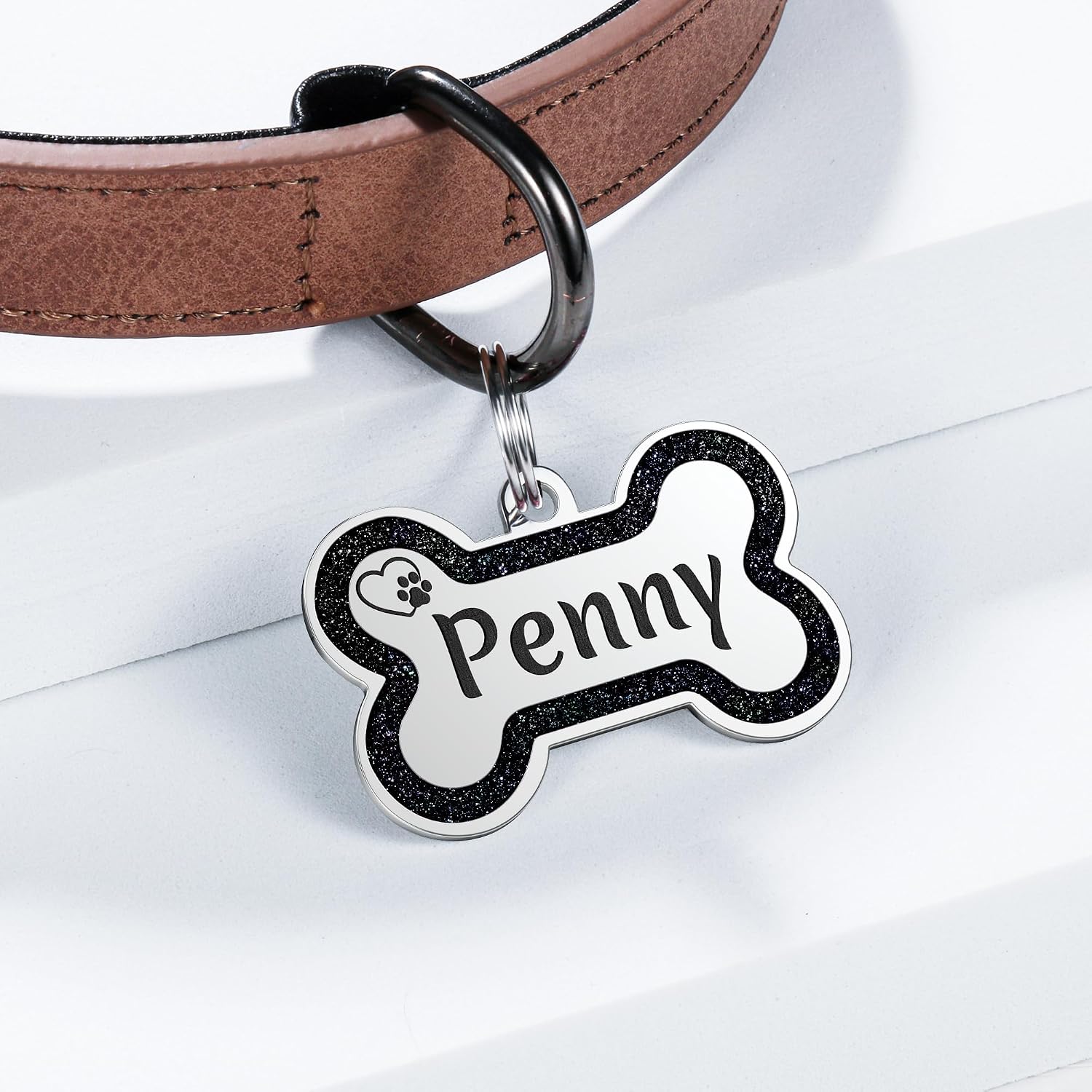 Pink glitter bone shaped personalized cat and dog safety identification collar tag.