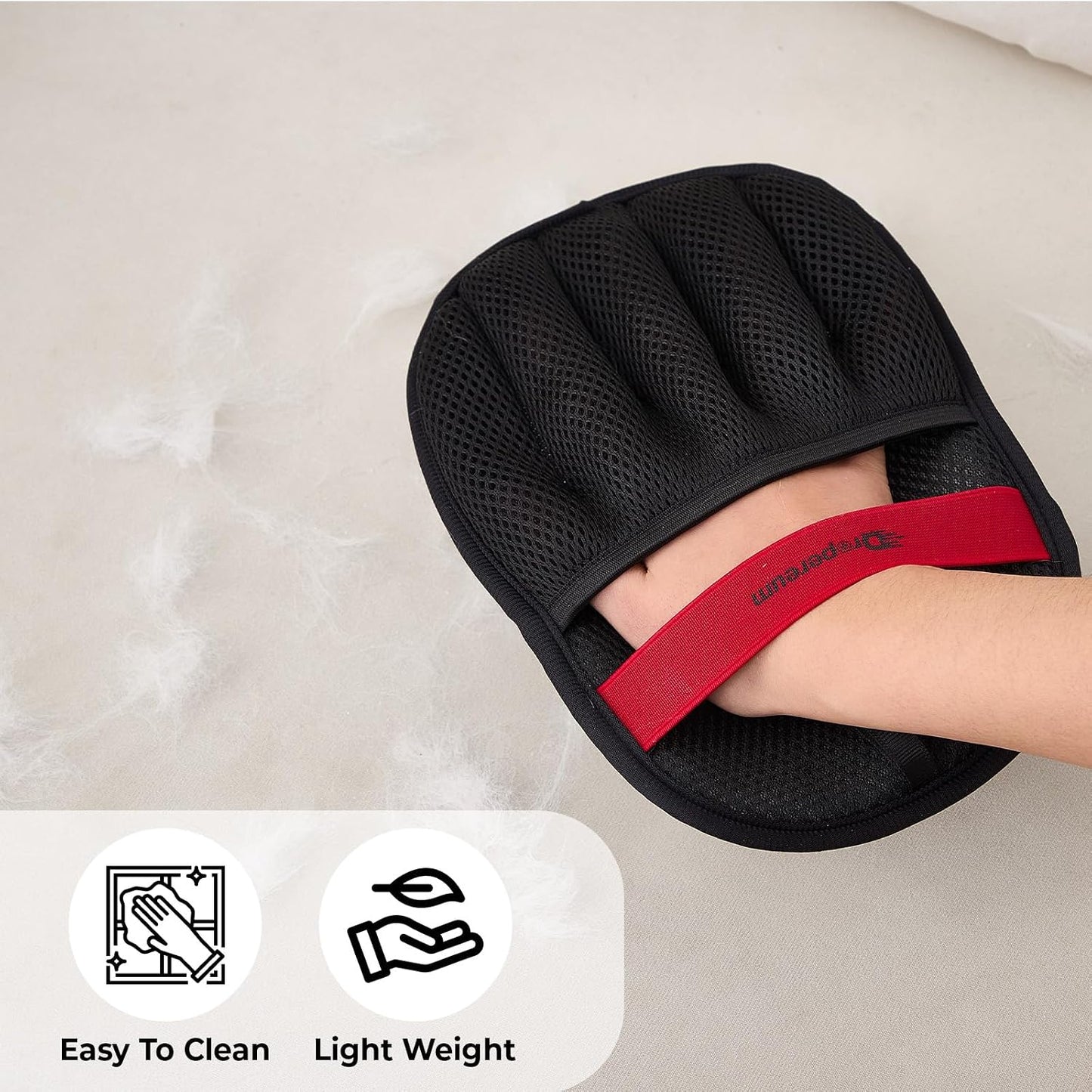 Washable electrostatic pet hair removal mitt being rinsed under water