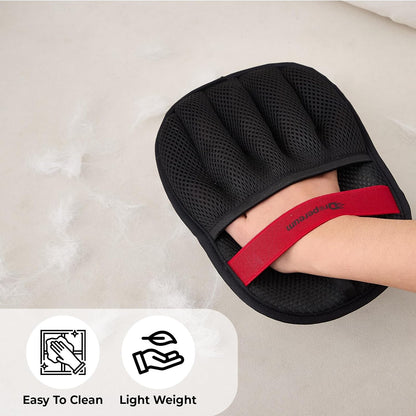 Washable electrostatic pet hair removal mitt being rinsed under water