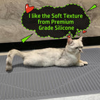 Hosing down the easy clean Mofason premium pet mat with water outdoors