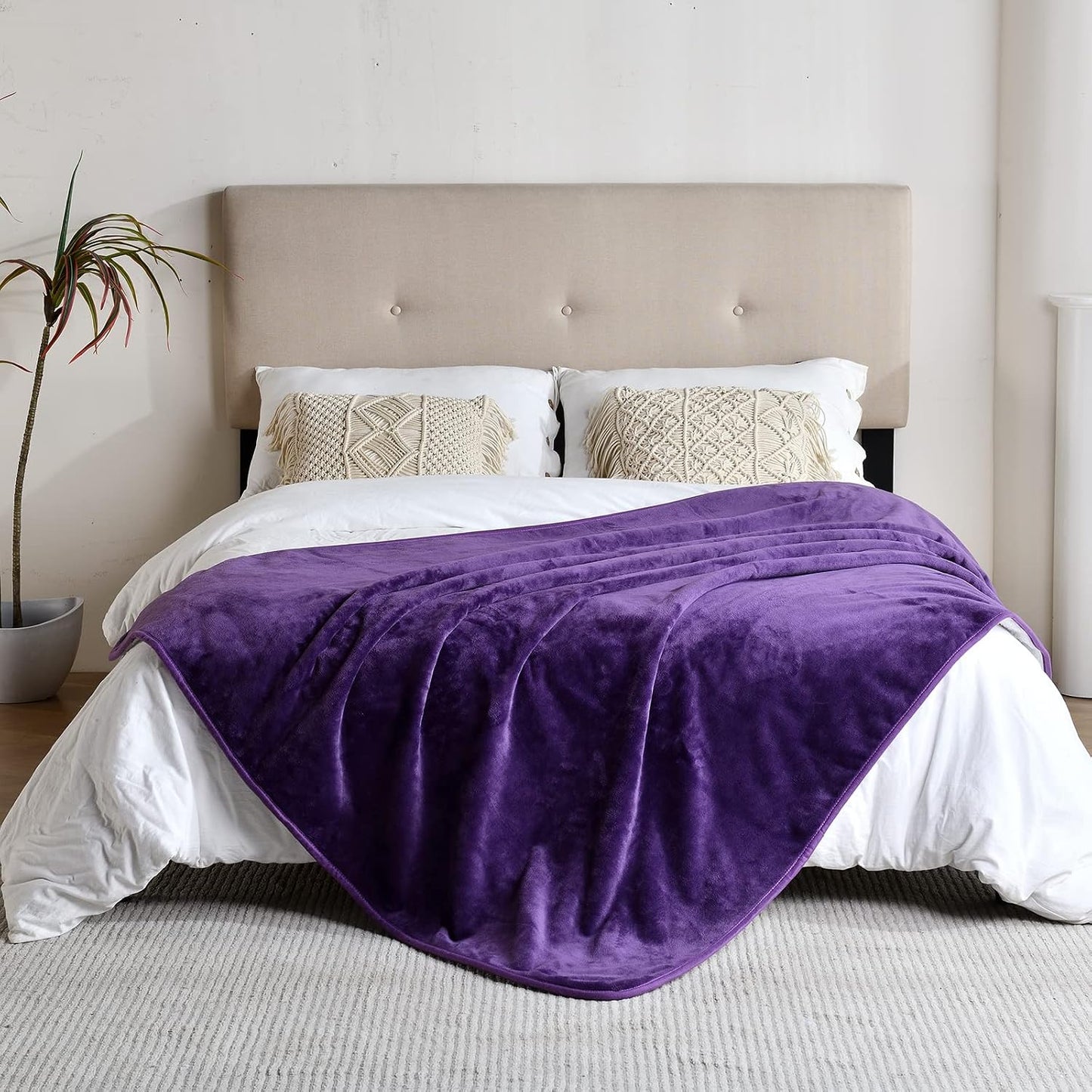 Yaning sherpa fleece furniture protector dark purple spread over a bed mattress
