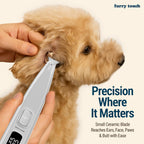 Furry Touch cordless pet trimmer highlighting the integrated LED light illuminating a dog paw pad during grooming.