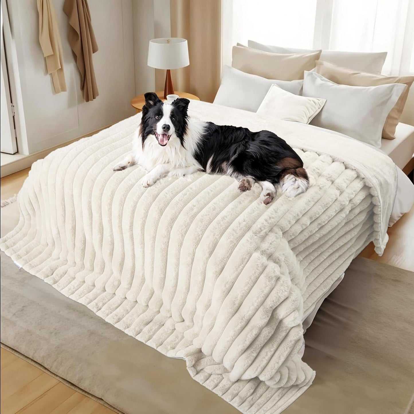 Zakapaws waterproof pet blanket front view laid out flat on a modern couch.