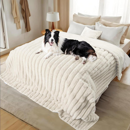 Zakapaws waterproof pet blanket front view laid out flat on a modern couch.