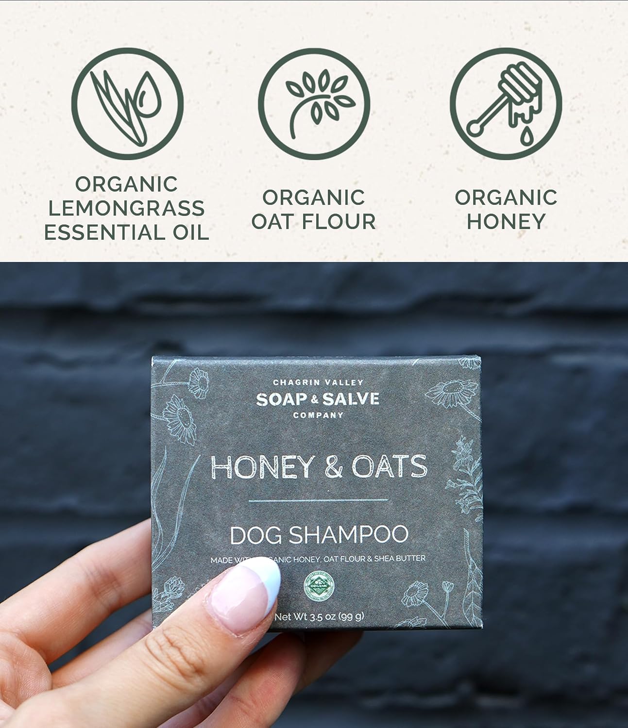 Chagrin Valley dog shampoo bar lathered in hands for grooming