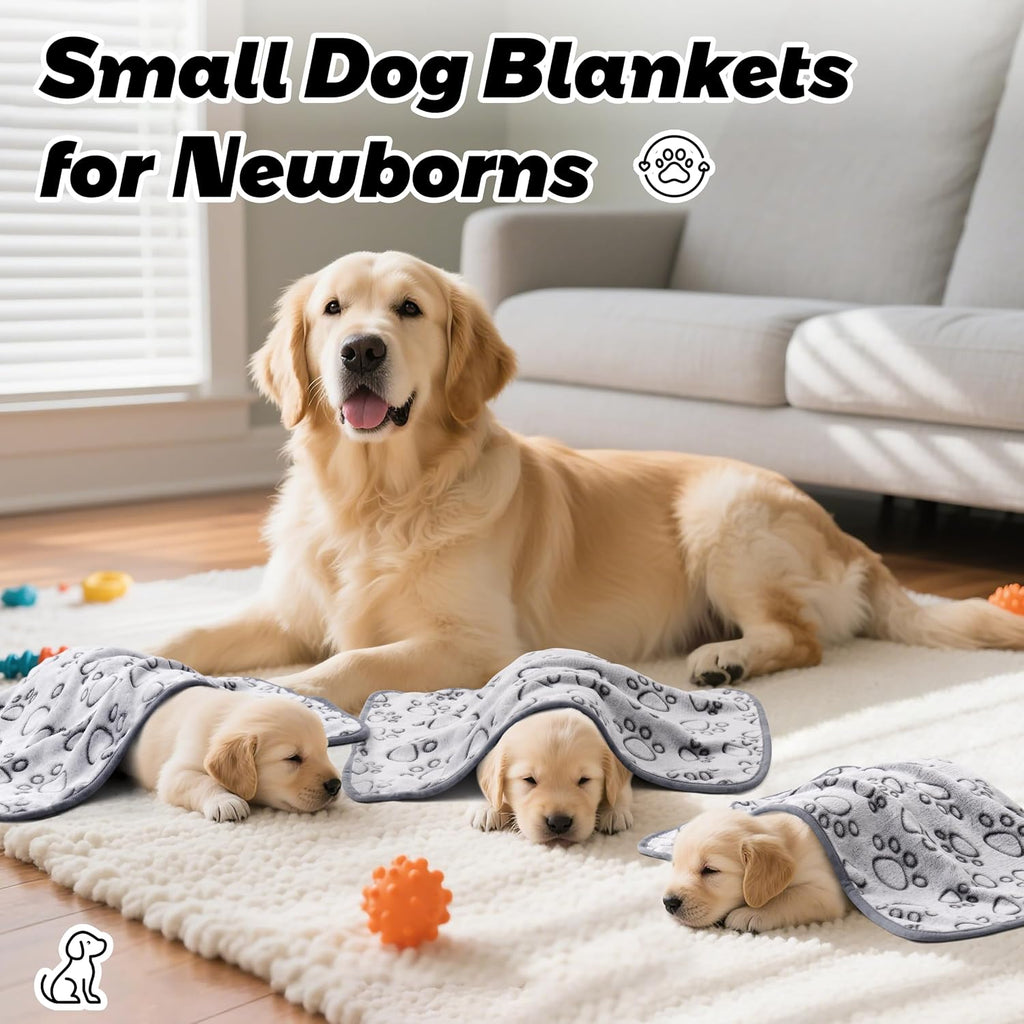 Three pieces of Stuffed grey pet blankets folded neatly demonstrating compact lightweight travel size.
