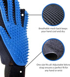 Blue Astra Vena pet hair remover glove catching loose dog fur during a massage session