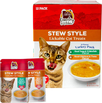 Happy cat eating Country Kitchen puree treat