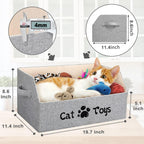 Collapsible grey linen pet storage basket filled with cat toys and treats