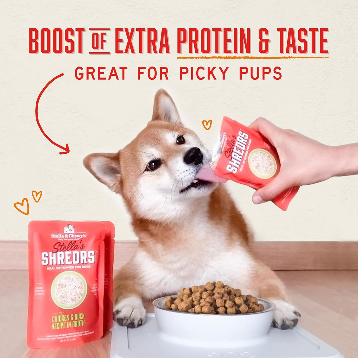 Healthy dog meal topper with shredded chicken
