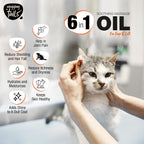 Applying Wagging Tails 6-in-1 oil to dog fur for shine