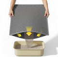 Kaxionage cat litter mat front view showing grey honeycomb surface.