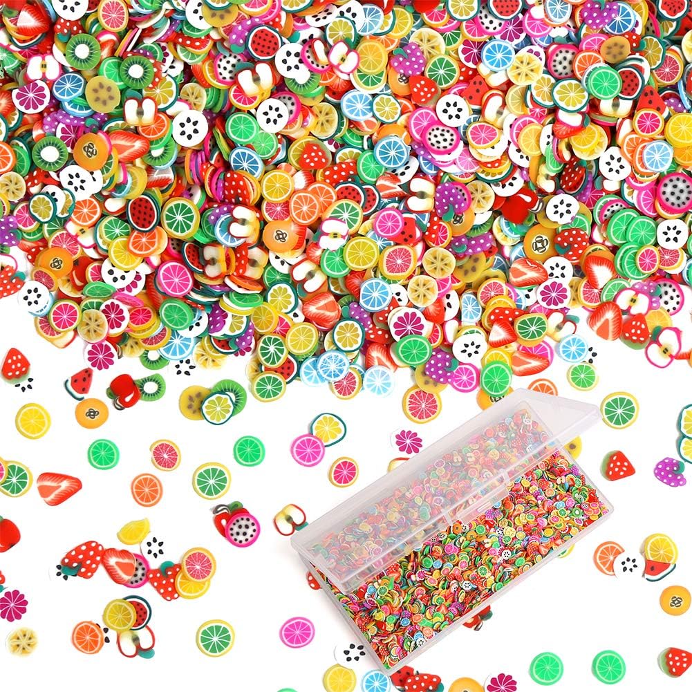 CCINEE 3D Fruit Nail Slices front view showing the clear organizer box filled with multicolored polymer clay pieces