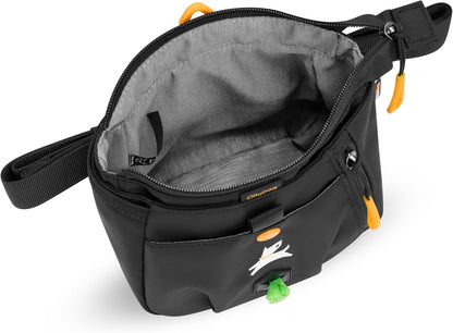 OllyDog Backcountry pet utility bag showing the secure top zipper closure and spacious interior compartment