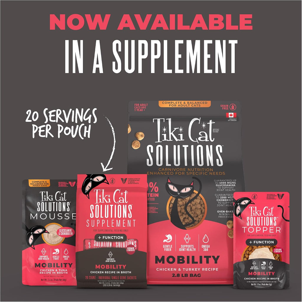 Healthy cat enjoying Tiki Cat Solutions Mobility Mousse topper