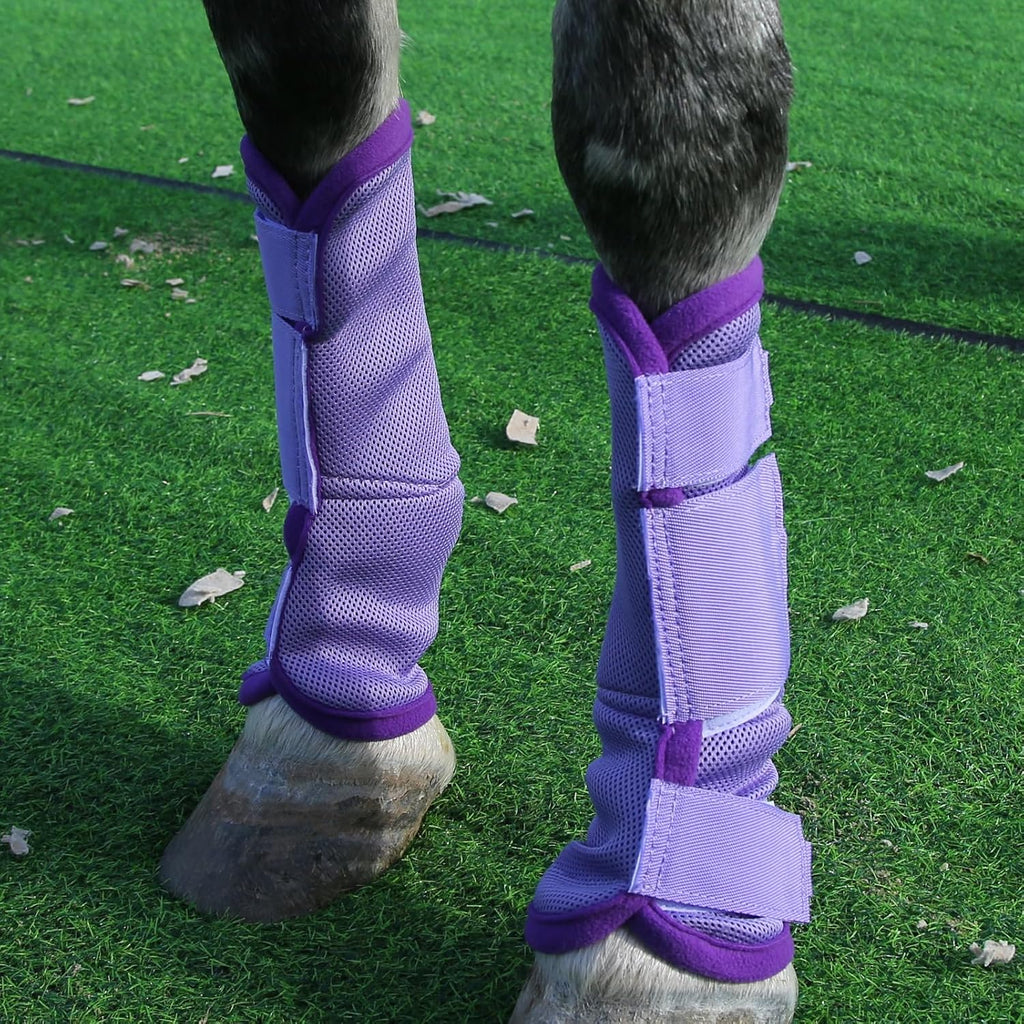 Four pack of purple mesh horse boots laid out flat showing contoured shape