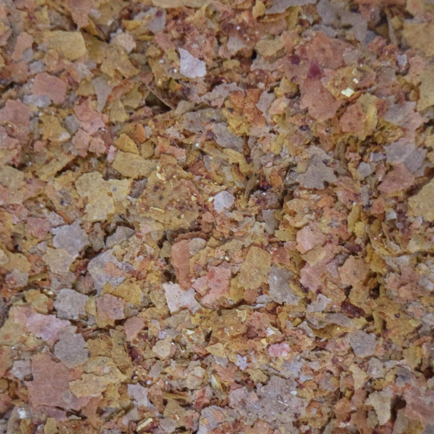 API Tropical Flakes container side profile showing ingredients