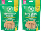 Authentic Project Hive dental treats being placed inside an enrichment toy