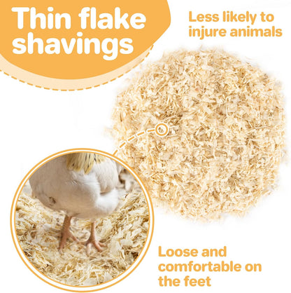 Hand fluffing Sukh wood shavings for coop